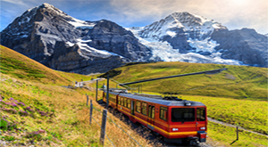 Alt tag: Famous electric red tourist train coming down from the Jungfraujoch station in Kleine Scheidegg,Bernese Oberland,Switz